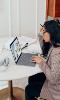 woman working at laptop